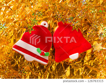 Christmas cookies Xmas red bell shape on golden 126763315