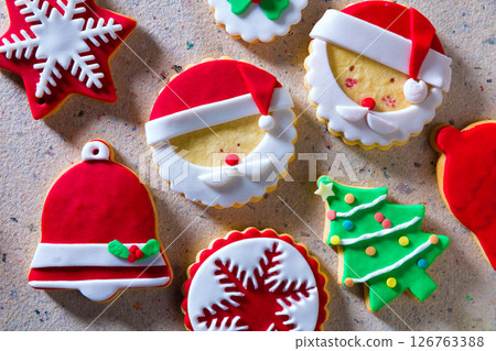 Christmas cookies Xmas tree Santa snowflake on recycled paper Christmas cookies Xmas tree Santa snowflake on recycled paper 126763388