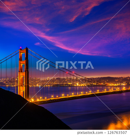 Golden Gate Bridge San Francisco sunset through cables 126763507