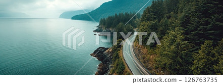 Peaceful drive through nature along a coastal forest road and ocean 126763735