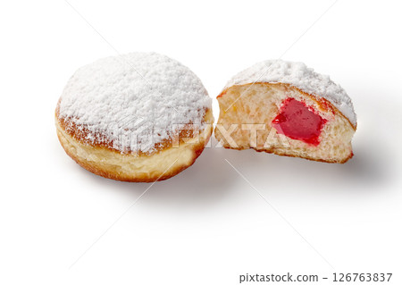 Delicious jelly doughnuts with powdered sugar on white background 126763837