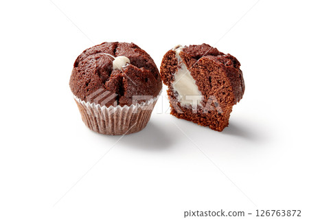 Delicious chocolate muffins with cream filling isolated on white background 126763872