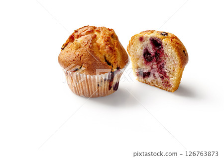 Delicious blueberry muffins isolated on white background showing its fluffy inside 126763873