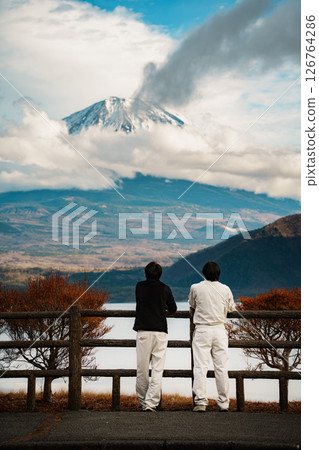 Snow Capped Mount Fuji Overlooking Lake Motosuko Snow Capped Mount Fuji Overlooking Lake Motosuko 126764286