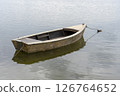 Old boat on the lake. 126764652