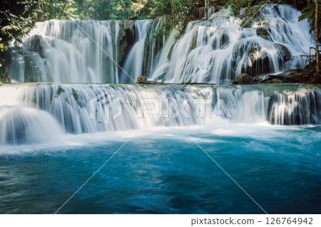 Scenic cascade waterfall in tropical jungle, long exposure 126764942