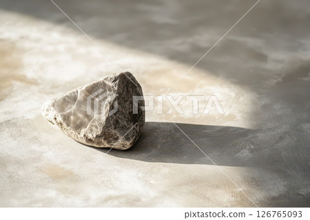 Unique rock formation casting a soft shadow 126765093