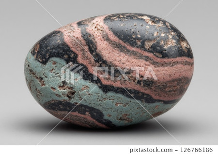 Polished Ovular Stone with Pink, Black, and Teal Bands 126766186