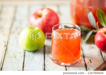 Glass of fresh apple juice Glass of fresh apple juice 126766604