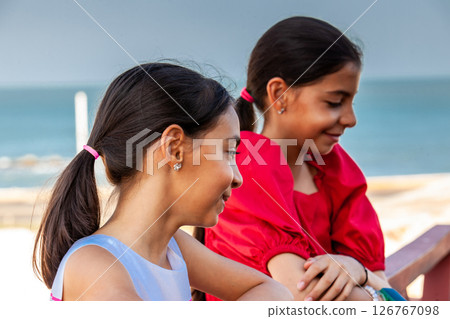 Beautiful young girls tourist in Cartagena de Indias. Colombian people. Travel concept. Real sisters. 126767098