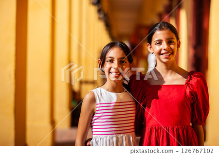 Beautiful young girls tourist in Cartagena de Indias. Colombian people. Travel concept. Real sisters. 126767102