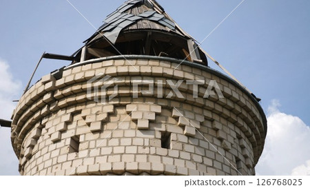 View to destroyed church at Kharkivska oblast. Ruined building after bomb attacks on ukrainian territory from russia army. Consequences of russian invasion of Ukraine. Slow motion 126768025