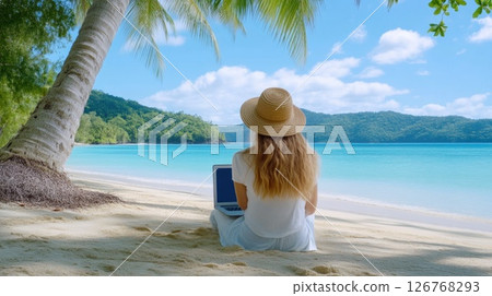 Young Woman Working Remotely by the Sea Young Woman Working Remotely by the Sea 126768293