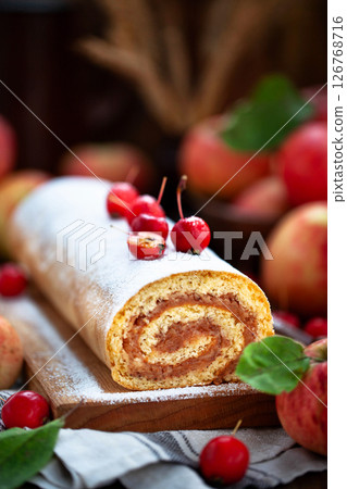Homemade fresh baked delicious apple sponge roll cake 126768716