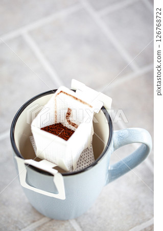 Hot black americano coffee and pouring milk Hot black americano coffee and pouring milk 126768722