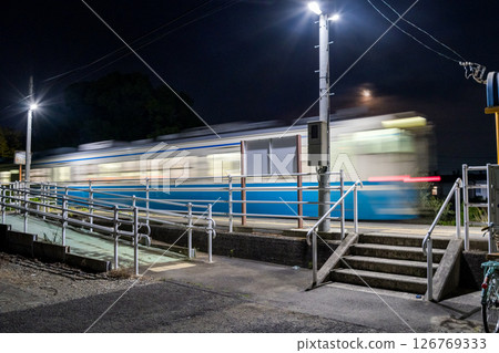 [Naruto Line] A local train departing from Kyoukaimae Station on a weekday evening 126769333