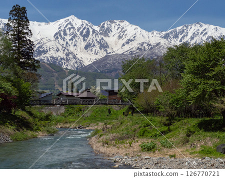 Snow still remaining in the Northern Alps mountains, Hakuba Village, Nagano Prefecture Snow still remaining in the Northern Alps mountains, Hakuba Village, Nagano Prefecture 126770721