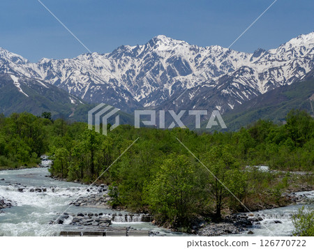 Snow still remaining in the Northern Alps mountains, Hakuba Village, Nagano Prefecture 126770722