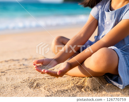Children playing on the beach at their travel destination 126770759