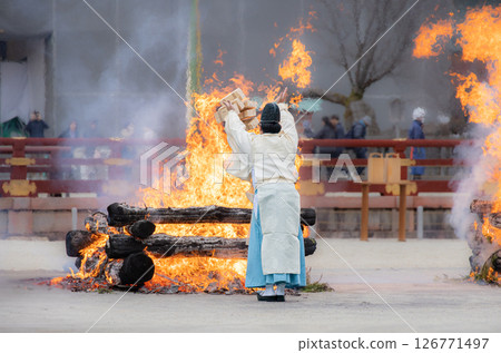 A priest burns offerings at the Setsubun Festival at Heian Shrine in Kyoto 126771497