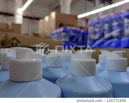 bottles liquid soap arranged in warehouse ready for distribution. closeup. 126772846