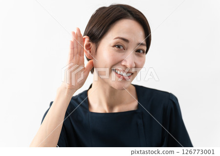 Young woman wearing beauty salon uniform Beauty image 126773001