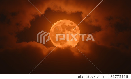 A full blood moon with dramatic swirling burnt orange and dull grey clouds 126773166