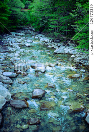 Mountain stream at dusk 126773359