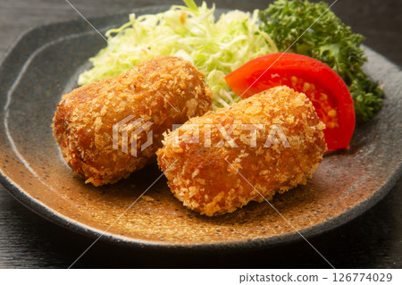 Croquettes in the shape of a rice ball 126774029