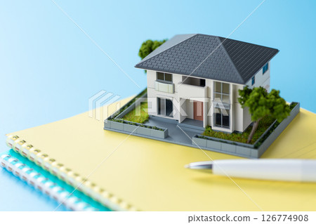 Houses and notebooks 126774908