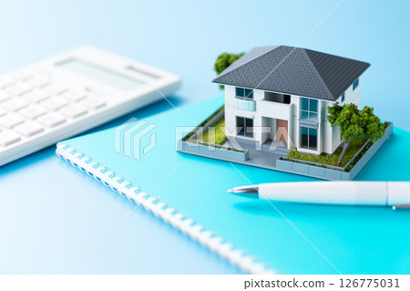 House and calculator and notebook 126775031