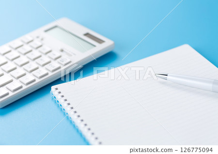 Calculator and notebook 126775094