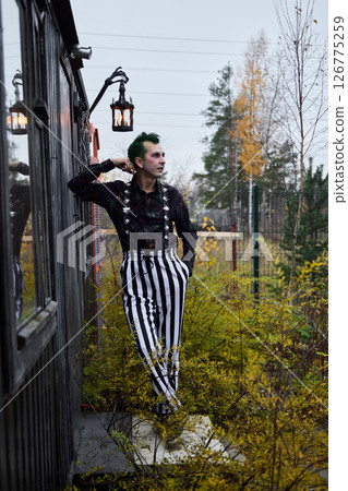 An Eclectic Fashion Portrait Captured Beautifully in an Autumn Setting with Vibrant Colors An Eclectic Fashion Portrait Captured Beautifully in an Autumn Setting with Vibrant Colors 126775259