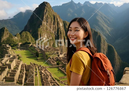 A beautiful Japanese woman smiles in Machu Picchu in the morning sun 126776867