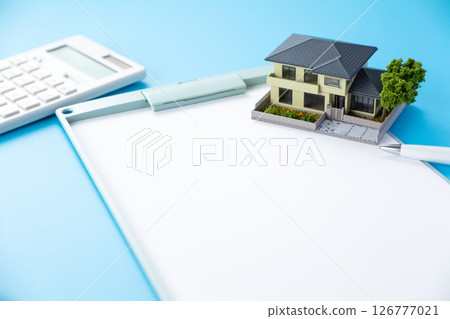 House, calculator and binder House, calculator and binder 126777021