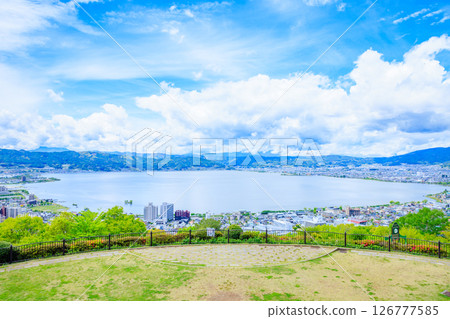Lake Suwa seen from Tateishi Park in early summer, Suwa City, Nagano Prefecture Lake Suwa seen from Tateishi Park in early summer, Suwa City, Nagano Prefecture 126777585