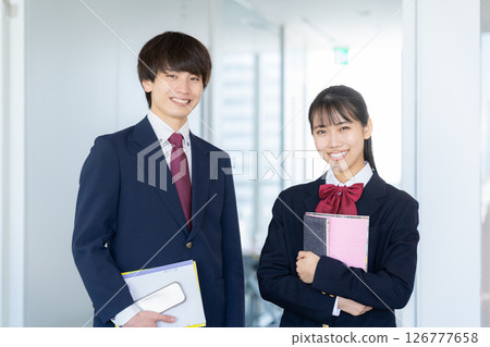 Male and female high school students studying at school. Photo courtesy of Denpa Gakuen Tokyo Electronics College 126777658