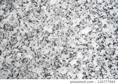 background with granite texture on white ceramic tiles. Decorative surface with artificial pattern 126777984