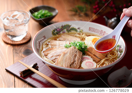Steaming authentic pork noodles with boiled egg and naruto Steaming authentic pork noodles with boiled egg and naruto 126778029