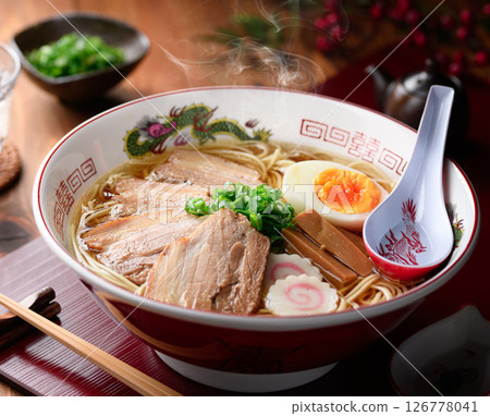 Steaming authentic pork noodles with boiled egg and naruto Steaming authentic pork noodles with boiled egg and naruto 126778041