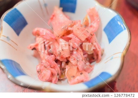 A small bowl of Japanese-style side dish featuring Kyoto pickles and pickled eggplants A small bowl of Japanese-style side dish featuring Kyoto pickles and pickled eggplants 126778472