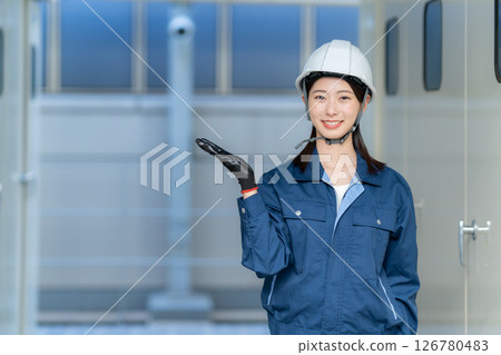 A female engineer performing building maintenance. Photo courtesy of Denpa Gakuen Tokyo Electronics College. A female engineer performing building maintenance. Photo courtesy of Denpa Gakuen Tokyo Electronics College. 126780483