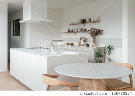 Dining kitchen and dining table (round table) in a newly built home Dining kitchen and dining table (round table) in a newly built home 126780534
