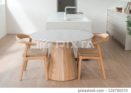 Dining kitchen and dining table (round table) in a newly built home Dining kitchen and dining table (round table) in a newly built home 126780535