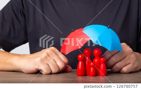 Hand holding umbrella and cover family. Hand holding umbrella and cover family. 126780757
