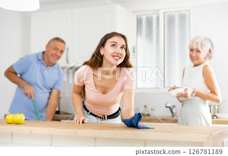 Family cleaning kitchen Family cleaning kitchen 126781189