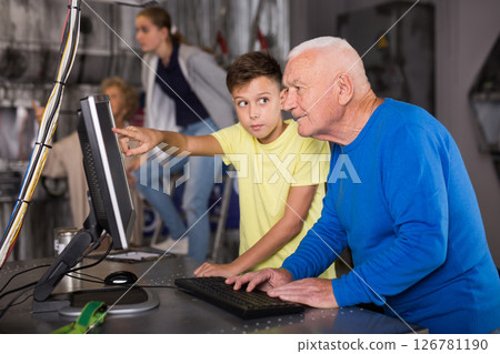 Grandparents and grandchildren in escape room Grandparents and grandchildren in escape room 126781190