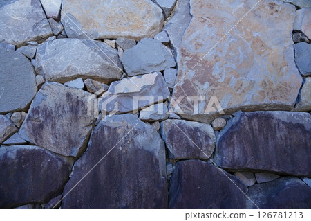 A stone wall with a flat surface A stone wall with a flat surface 126781213