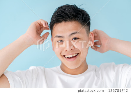 Young men's hair care 126781742