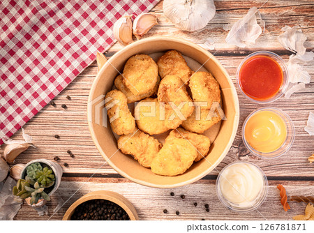 The Frence fire and nuggets  in paper bowl for food concept. 126781871